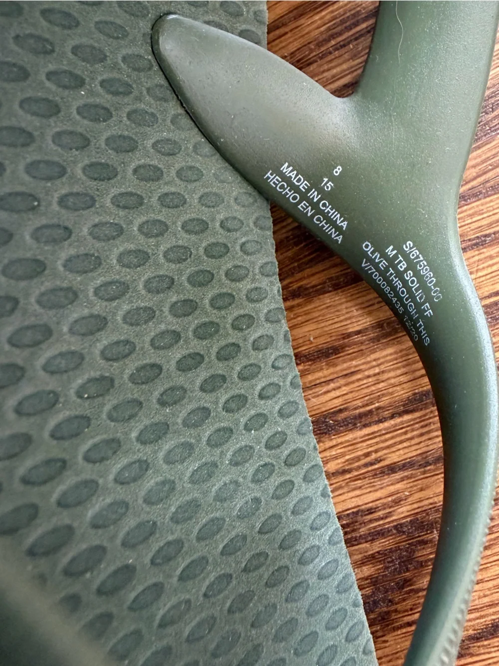 Old Navy olive green flip flops, toddler size 8
